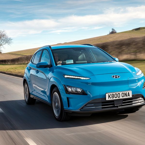 Hyundai Kona electric car driving through countryside